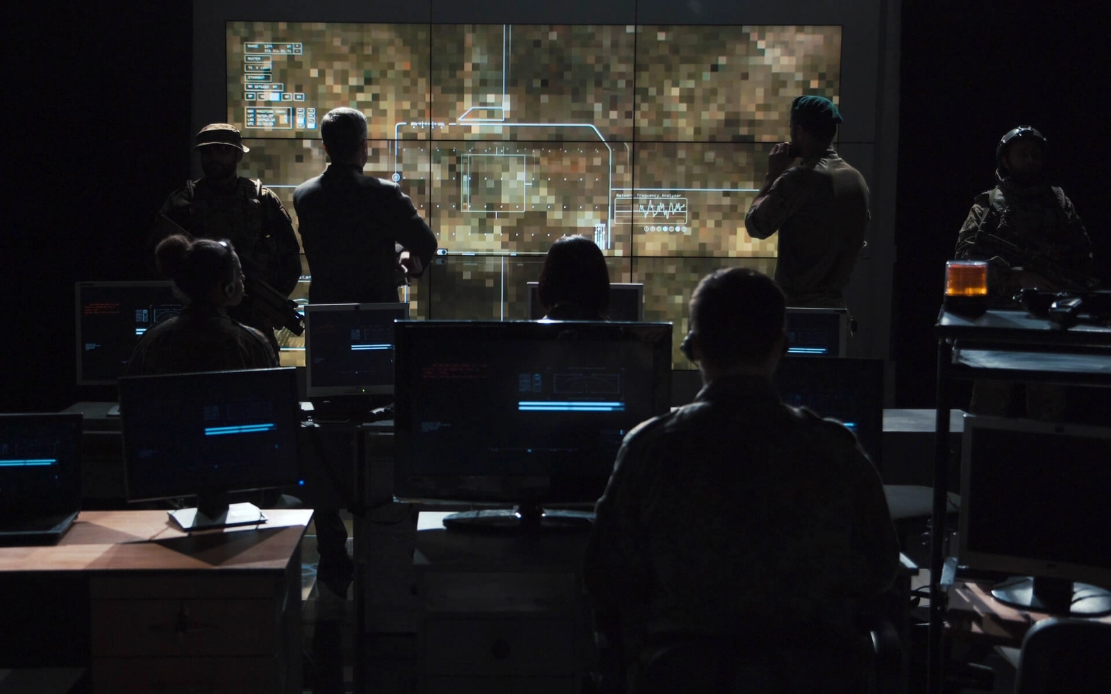 Image of military team discussion in a room